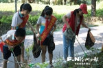 光明港公园“爱绿护绿”志愿者行动如火如荼展开 - 福州新闻网