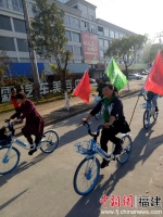 会后，志愿者们参加三明代表处组织的志愿者骑行活动。主办方供图 - 福建新闻