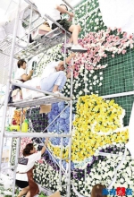 主宾省云南馆用15000朵鲜花搭建“花墙”。 - 新浪
