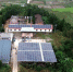图为10月10日拍摄的位于福建省武平县下坝乡美溪村的集中式光伏发电项目。　张斌　摄 - 福建新闻