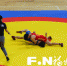 福州代表团的张佳丽（红衣）夺得女子乙组60公斤级摔跤冠军。 - 新浪