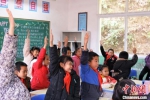 　　政和县西津畲族小学学生们踊跃回答问题。　供图 摄 - 福建新闻