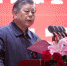 中国关工委常务副主任胡振民宣读原中组部部长张全景贺信。(张丽君摄) - 福建新闻