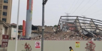 福建省泉州市欣佳酒店“3·7”坍塌事故完成搜救工作后，现场被围挡拦起。　孙虹 摄 - 福建新闻